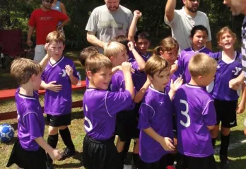 soccer team celebrates
