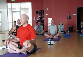 people practicing yoga