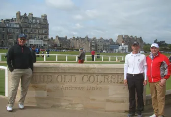 Rob poses for a photo by the golf course at St. Andrews.