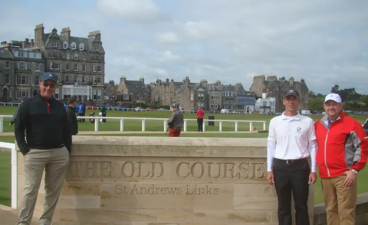 Rob poses for a photo by the golf course at St. Andrews.