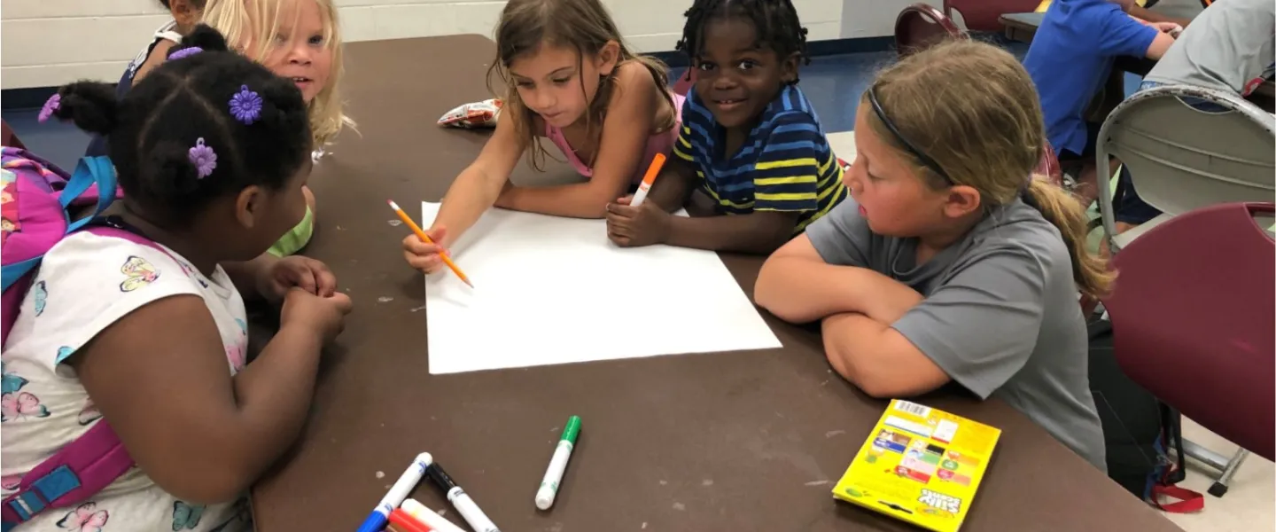 kids drawing together