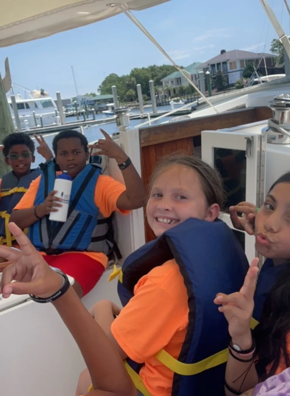 group of teens on sailing trip
