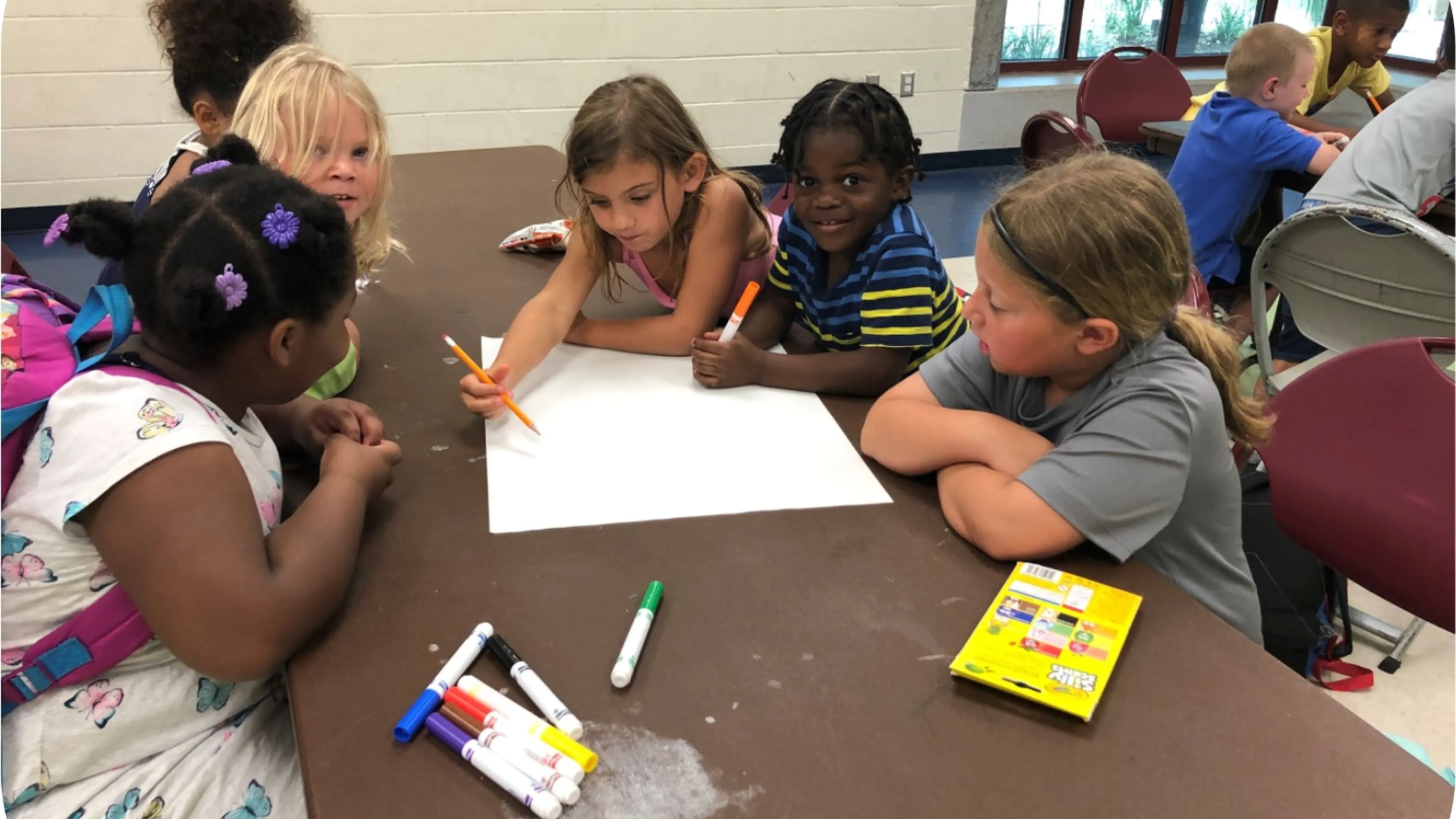 kids drawing together