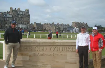 Rob poses for a photo by the golf course at St. Andrews.